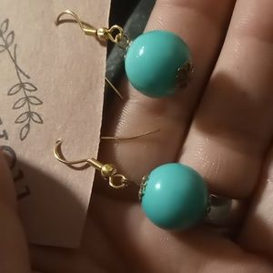 Turquoise beaded in gold tone earrings. Nwot